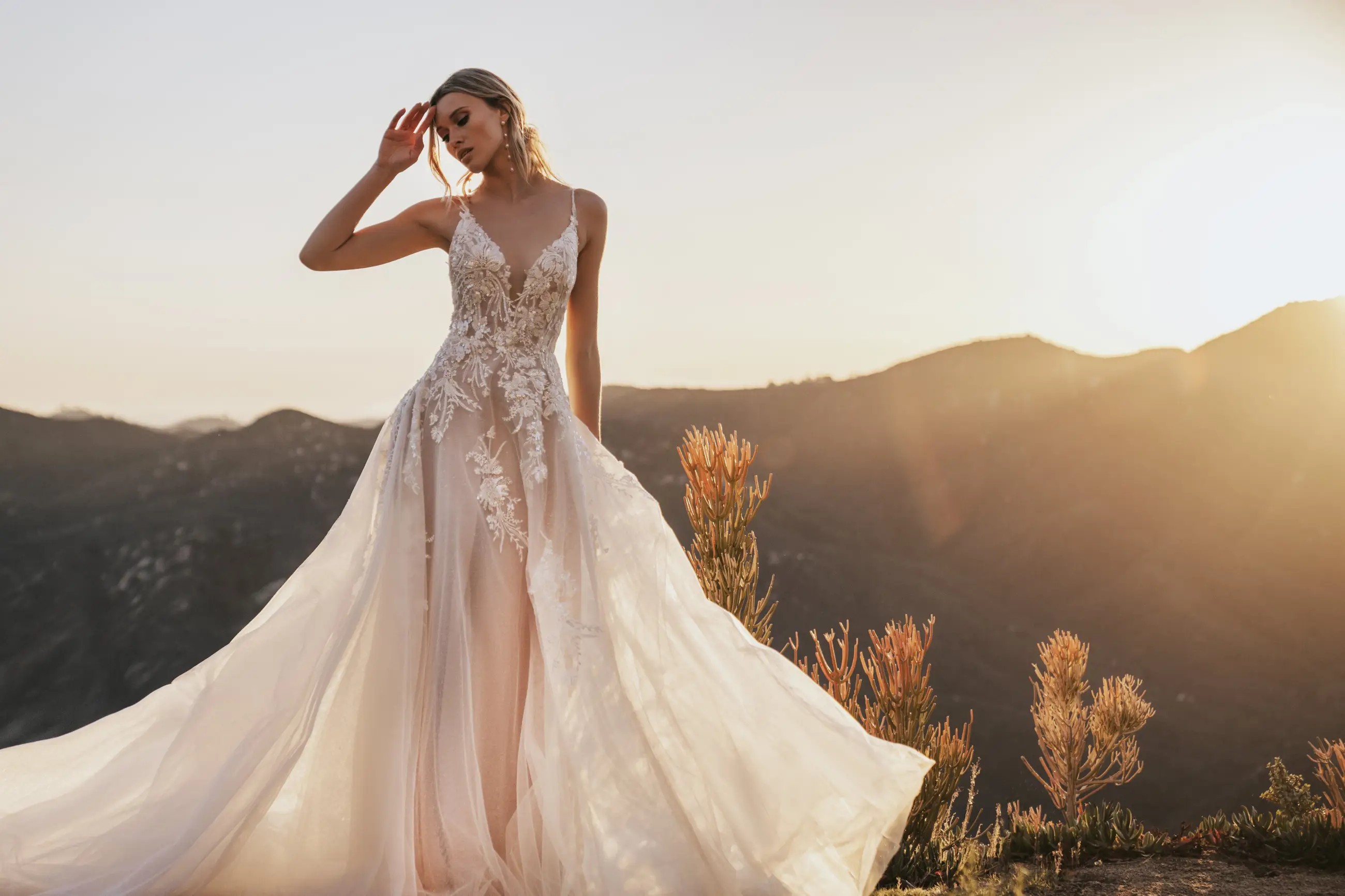 Model wearing a white Maggie Sottero Gown