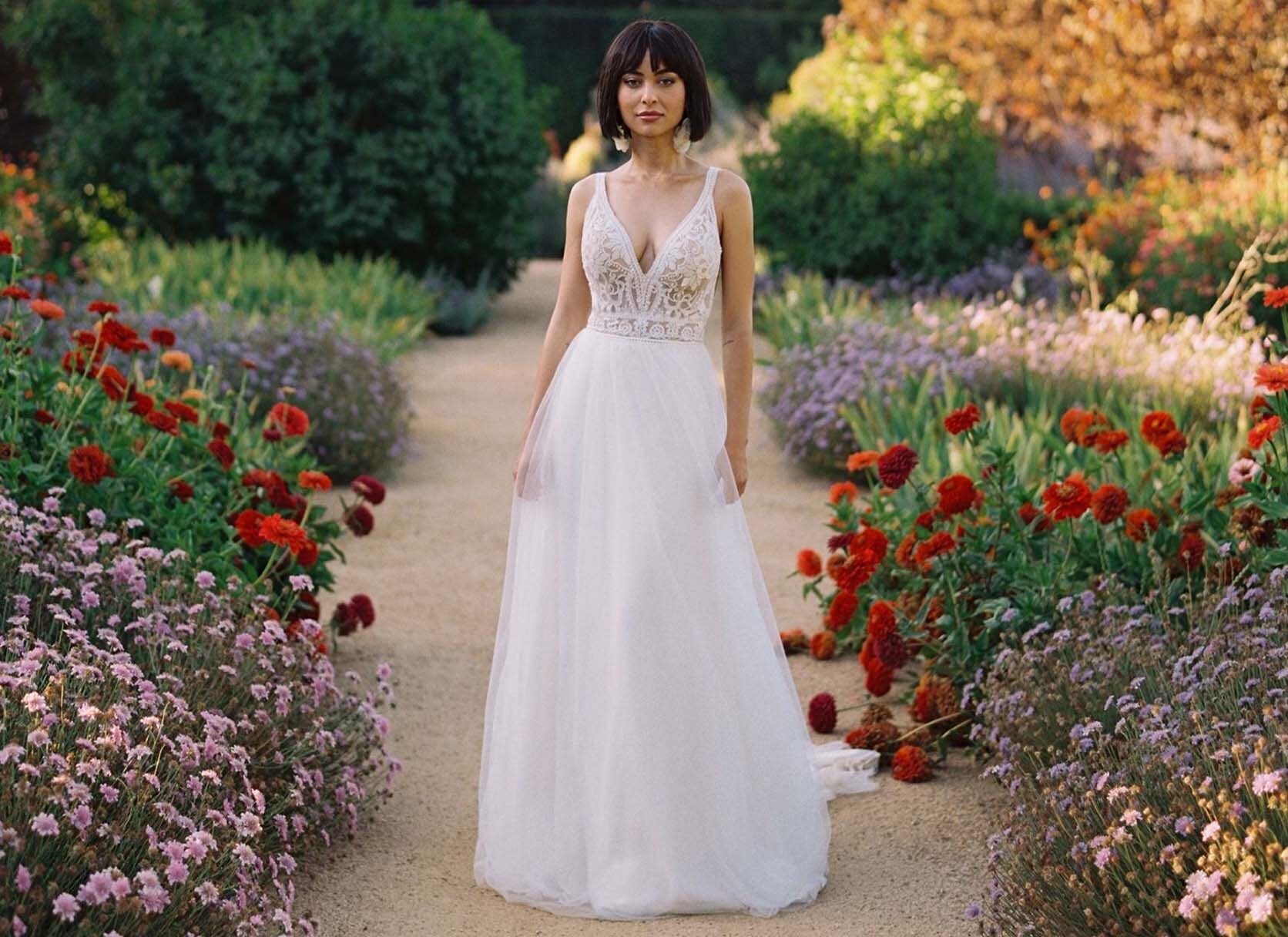 Model wearing a white Halter Style Wedding Dress
