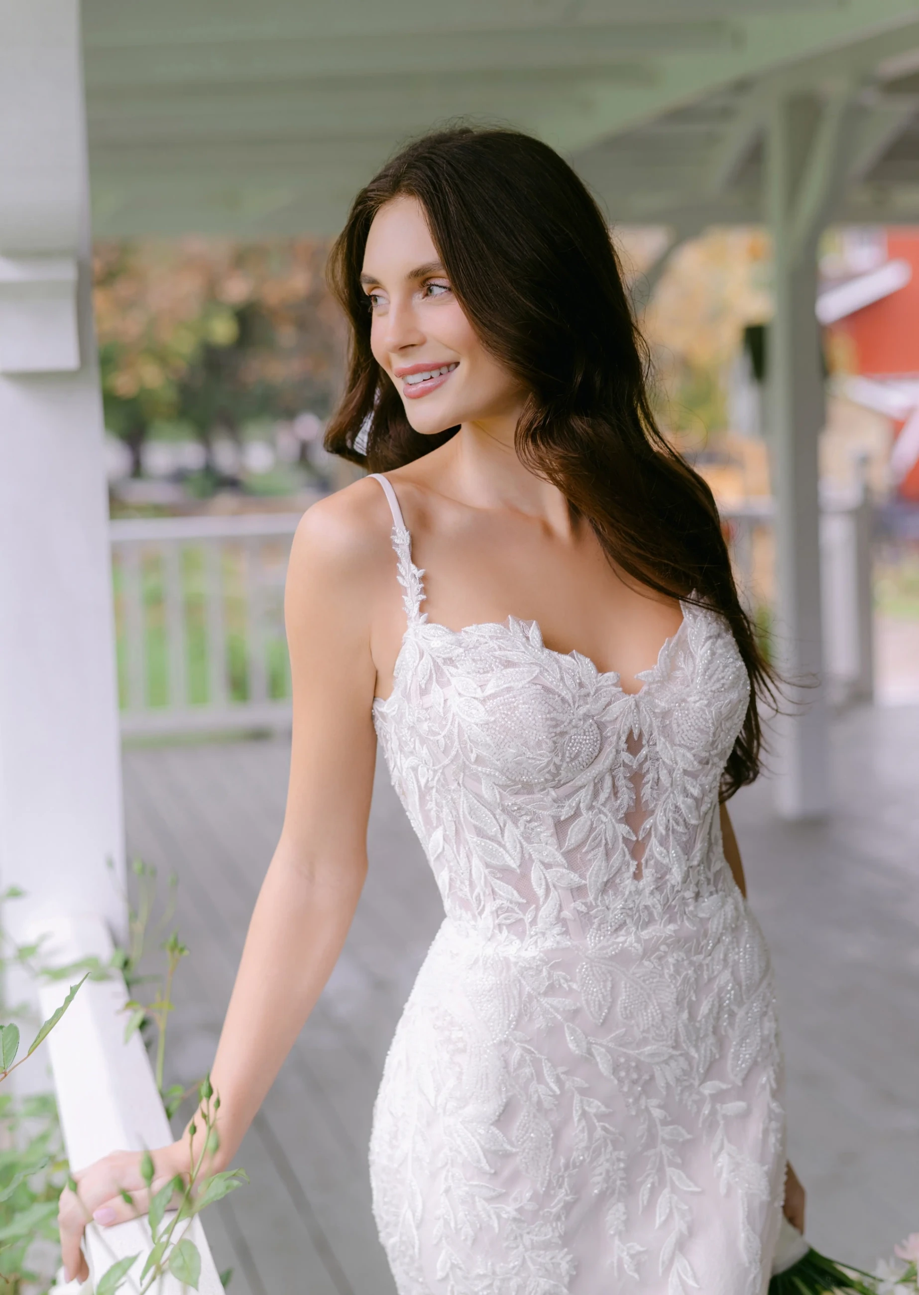 Model wearing a white Allure Gown