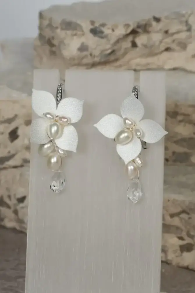 image shows a pair of beautiful bridal earrings