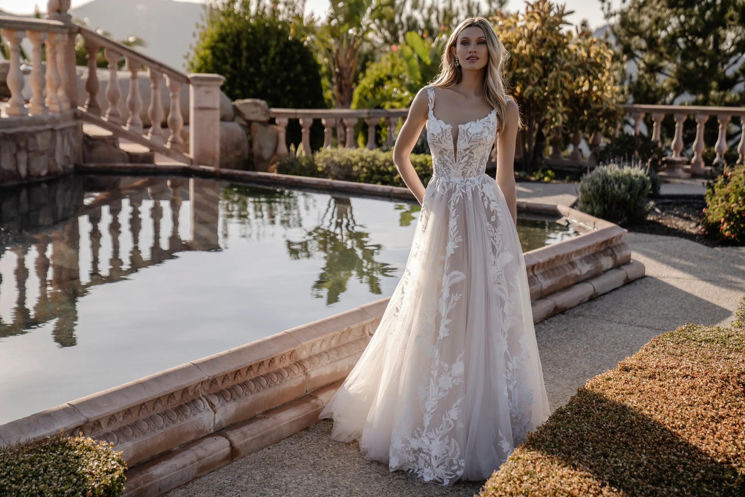 Model wearing a white Halter Style Wedding Dress