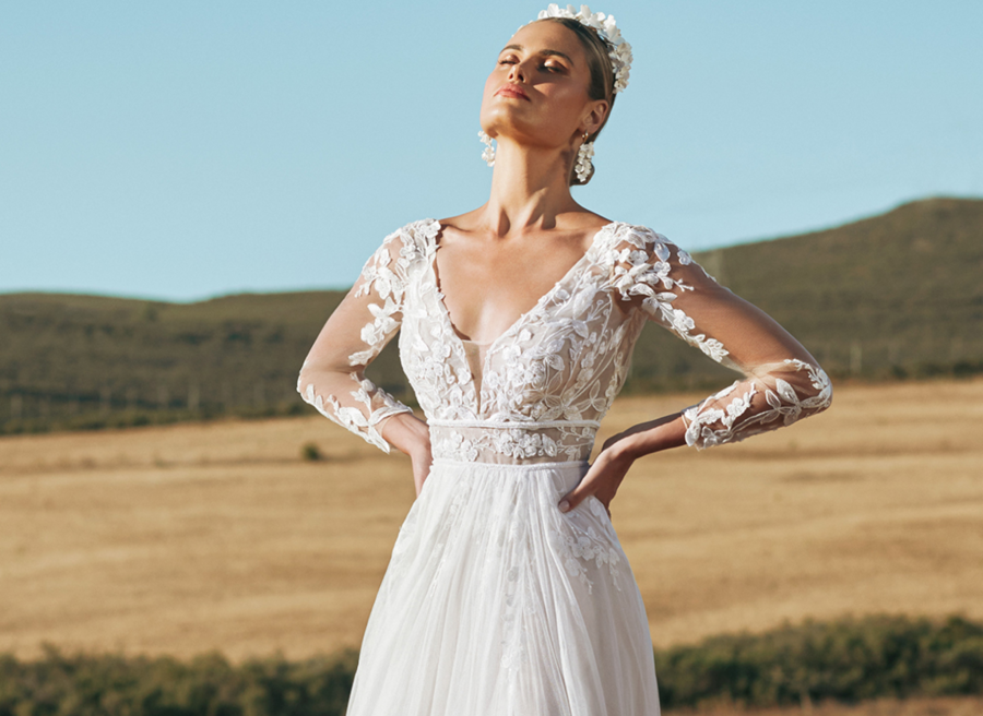 Model wearing a white Long Sleeved Style Dress