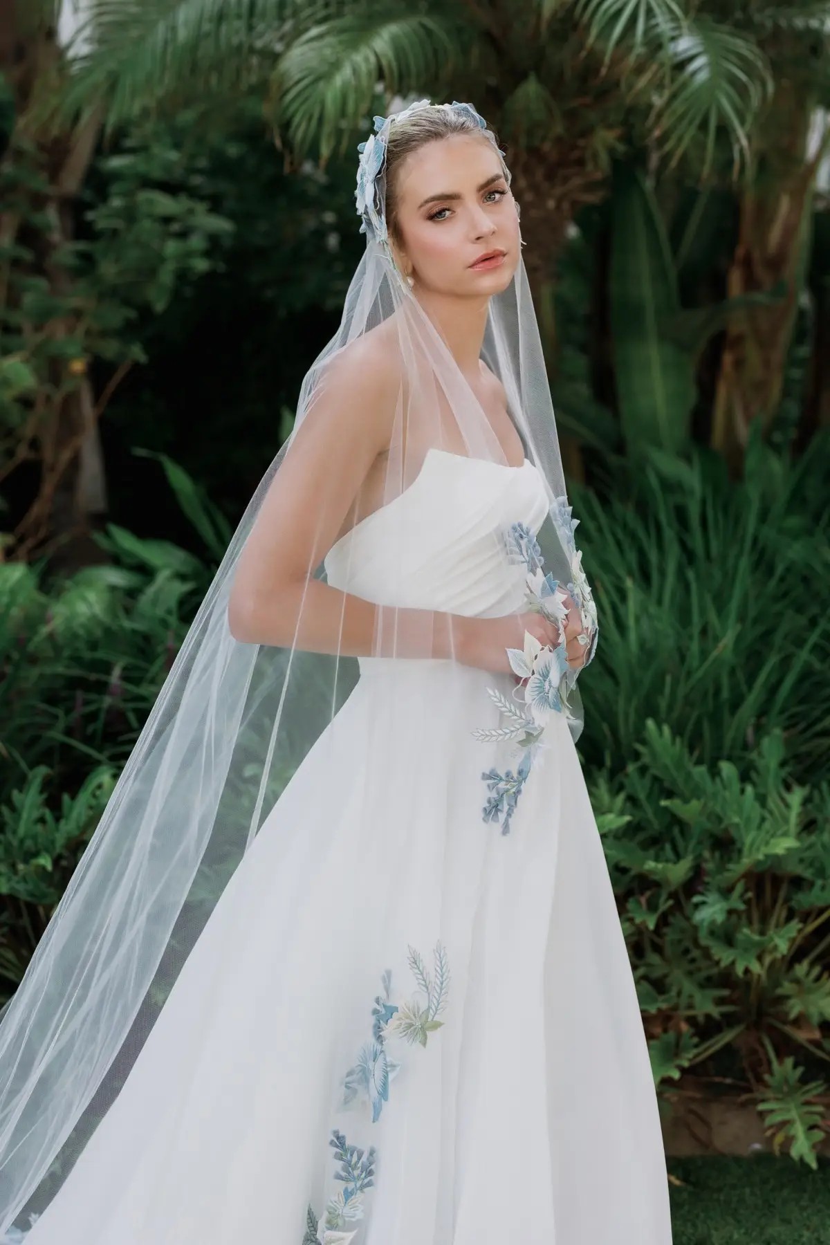 Model wearing a white Strapless Style Dress